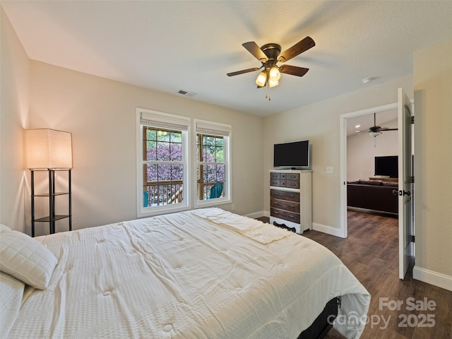 101 Meadowbrook Dr, Franklin, NC 28734 - bedroom featuring dark wood finished floors and ceiling fan