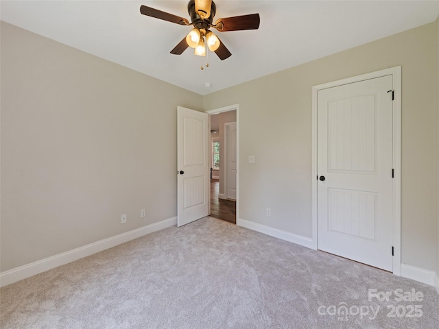 101 Meadowbrook Dr, Franklin, NC 28734 - unfurnished bedroom with carpet flooring and a ceiling fan