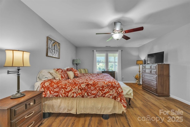 5158 Jenkins Rd, Morganton, NC 28655 - bedroom featuring dark wood-type flooring and a ceiling fan