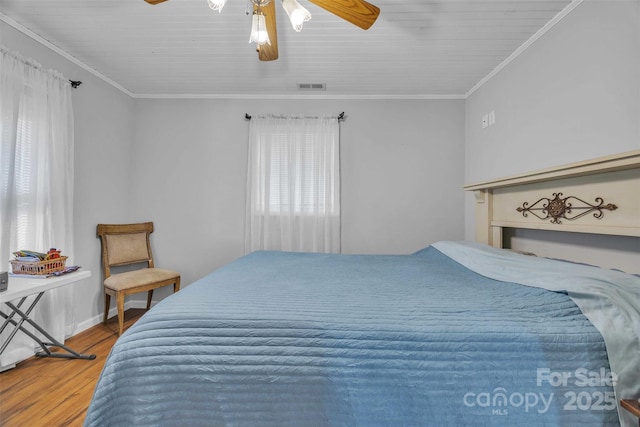 5158 Jenkins Rd, Morganton, NC 28655 - bedroom with wood finished floors, multiple windows, crown molding, and ceiling fan