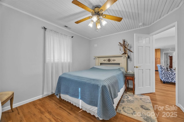 5158 Jenkins Rd, Morganton, NC 28655 - bedroom with crown molding, wood finished floors, a ceiling fan, and wood ceiling