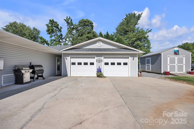5158 Jenkins Rd, Morganton, NC 28655 - garage with driveway and a storage shed