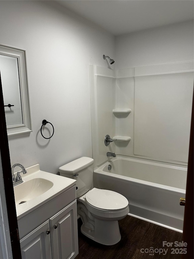 1116 Lenoir Ave SW, Lenoir, NC 28645 - full bathroom featuring vanity, shower / washtub combination, and wood finished floors