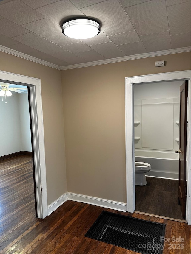 1116 Lenoir Ave SW, Lenoir, NC 28645 - corridor with dark wood-type flooring and crown molding