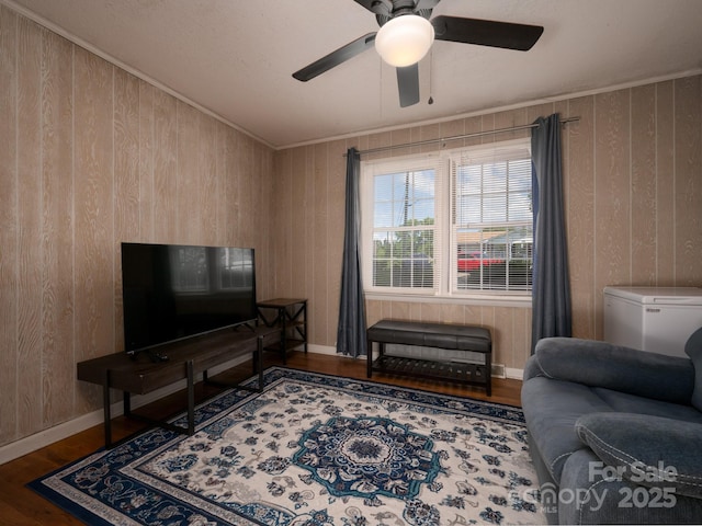 69 Katydid Dr, Marion, NC 28752 - living room with wood finished floors, ceiling fan, wooden walls, and crown molding