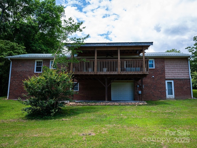 69 Katydid Dr, Marion, NC 28752 - rear view of house featuring an attached garage, ceiling fan, a lawn, a wooden deck, and brick siding