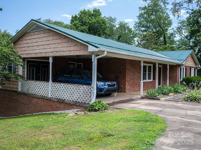 69 Katydid Dr, Marion, NC 28752 - view of parking / parking lot with driveway and a carport