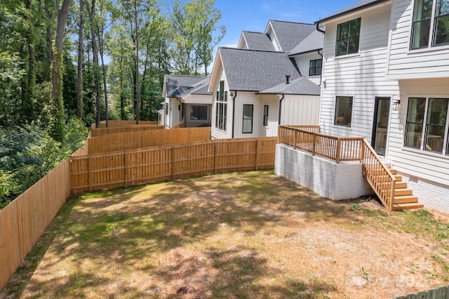 3937 Plainview Rd, Charlotte, NC 28208 - fenced backyard with a deck and stairway