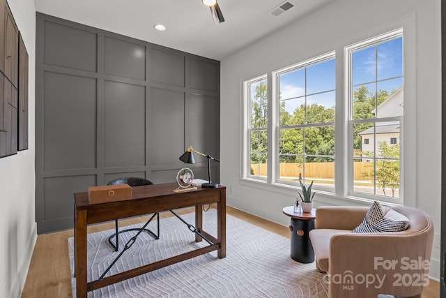 3937 Plainview Rd, Charlotte, NC 28208 - home office with a decorative wall, light wood-type flooring, recessed lighting, and a ceiling fan