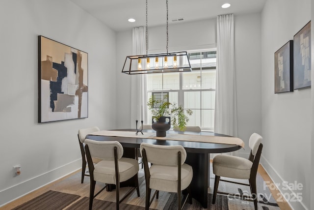 3937 Plainview Rd, Charlotte, NC 28208 - dining area with a chandelier and recessed lighting