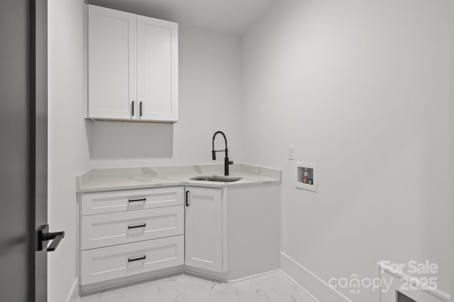 3937 Plainview Rd, Charlotte, NC 28208 - washroom featuring hookup for a washing machine, light marble finish flooring, and cabinet space