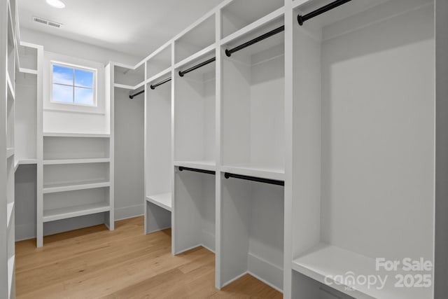 3937 Plainview Rd, Charlotte, NC 28208 - walk in closet featuring light wood-style floors