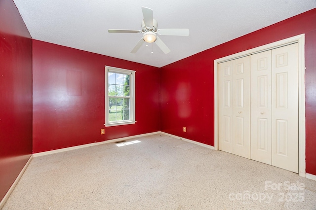 38367 Loblolly Ln, New London, NC 28127 - unfurnished bedroom featuring carpet, a closet, and ceiling fan