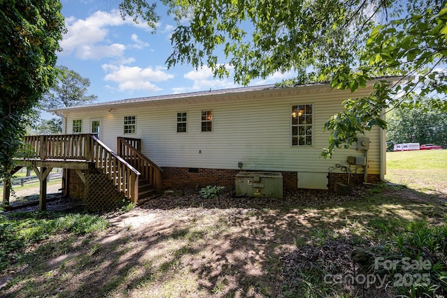 38367 Loblolly Ln, New London, NC 28127 - back of house featuring crawl space, a deck, and stairs