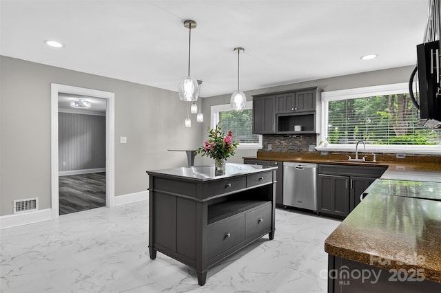 3127 N Center St, Hickory, NC 28601 - kitchen featuring dishwasher, light marble finish flooring, plenty of natural light, and recessed lighting