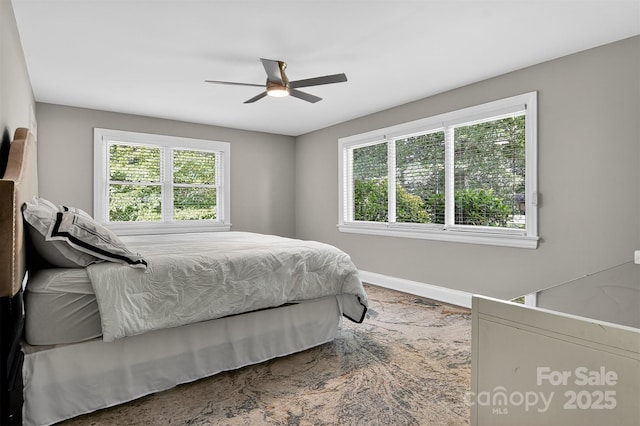 3127 N Center St, Hickory, NC 28601 - bedroom with baseboards and a ceiling fan