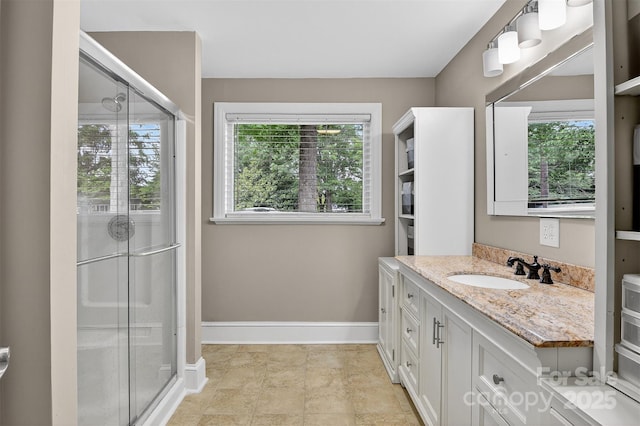 3127 N Center St, Hickory, NC 28601 - full bath featuring vanity, plenty of natural light, and a stall shower