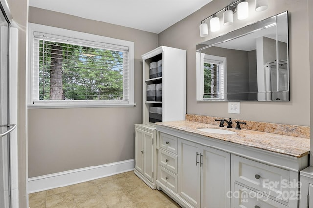 3127 N Center St, Hickory, NC 28601 - full bath featuring healthy amount of natural light, vanity, and tile patterned floors