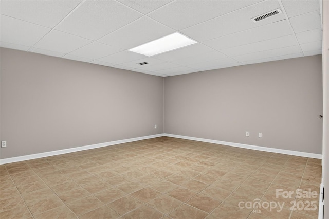3127 N Center St, Hickory, NC 28601 - unfurnished room with a drop ceiling and baseboards