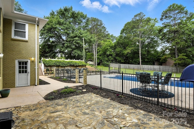 3127 N Center St, Hickory, NC 28601 - view of pool featuring a patio and view of scattered trees
