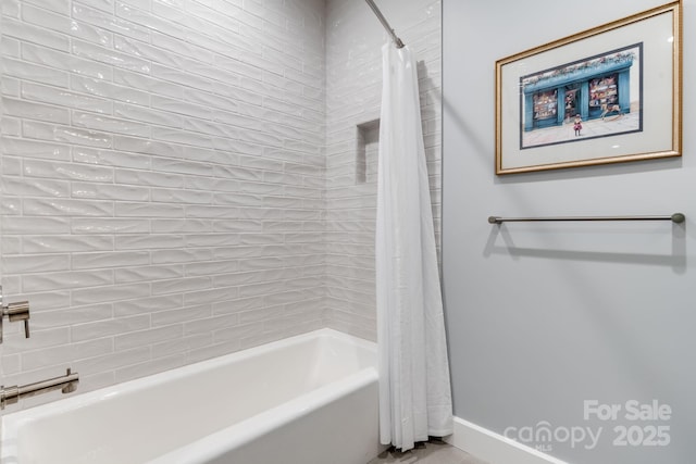 1416 E Clubhouse Rd Unit 73, Sylva, NC 28779 - bathroom with shower / bath combination with curtain and baseboards