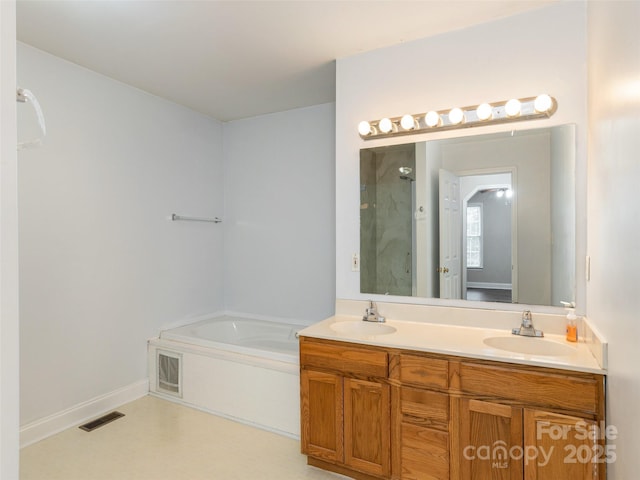 30 Collenwood Rd, Arden, NC 28704 - full bathroom featuring double vanity, a garden tub, and a shower