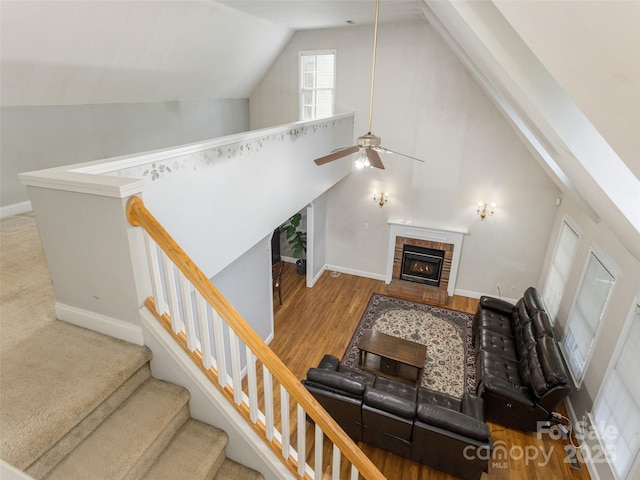 30 Collenwood Rd, Arden, NC 28704 - living room with lofted ceiling, ceiling fan, a fireplace, wood finished floors, and stairway