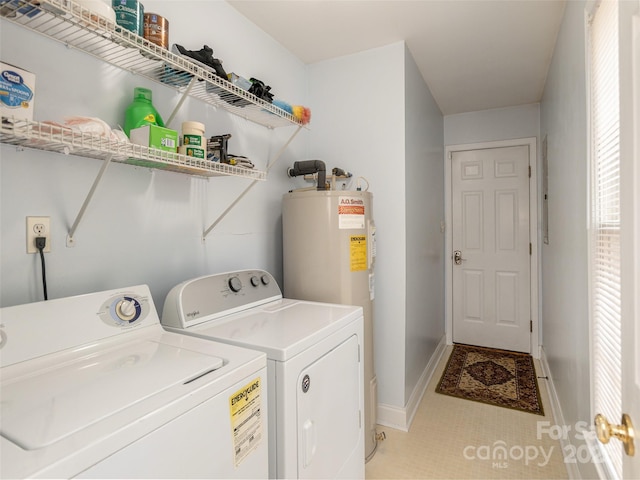 30 Collenwood Rd, Arden, NC 28704 - laundry area with washing machine and clothes dryer, water heater, plenty of natural light, and light tile patterned floors