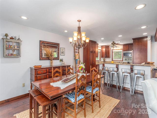 1411 Kitchens Branch Rd, Sylva, NC 28779 - dining area featuring recessed lighting, dark wood-style floors, a chandelier, and ceiling fan