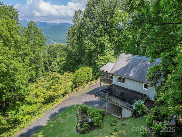 1411 Kitchens Branch Rd, Sylva, NC 28779 - aerial view of property and surrounding area featuring a forest and mountains