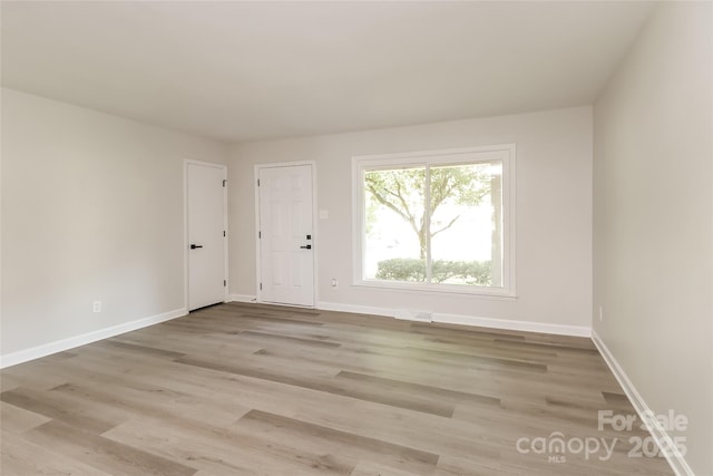 835 Carrington Dr, Charlotte, NC 28214 - spare room featuring light wood-type flooring