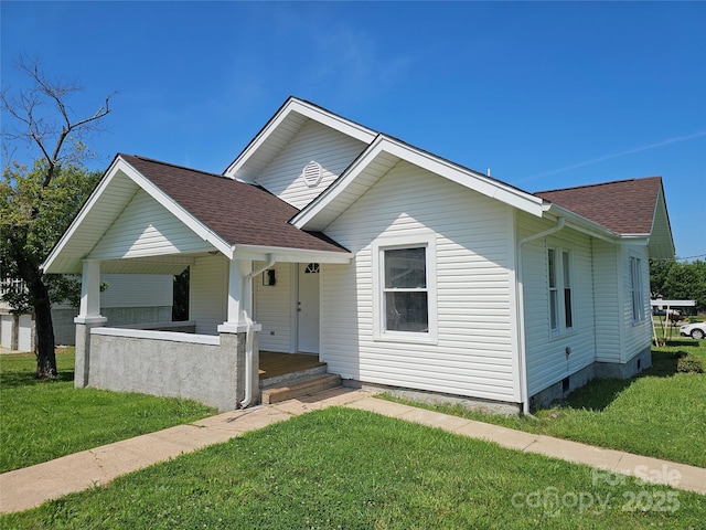 1704 16th St NE, Hickory, NC 28601 - bungalow-style home featuring covered porch, roof with shingles, and a front lawn