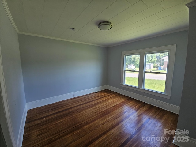 1704 16th St NE, Hickory, NC 28601 - spare room with dark wood-style flooring and ornamental molding