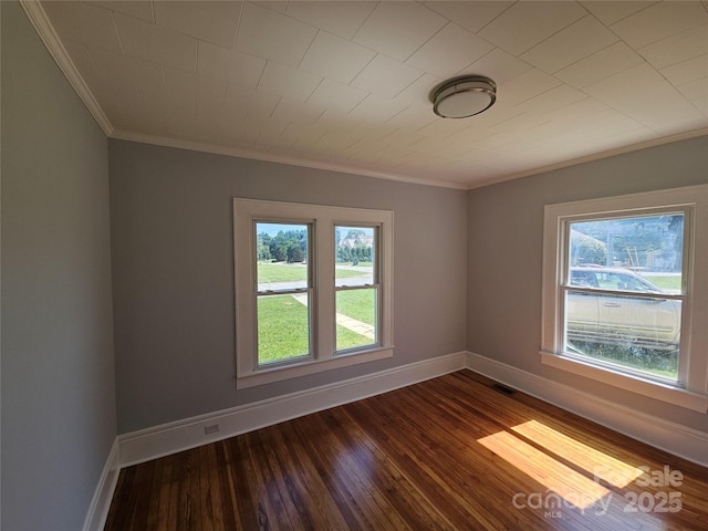 1704 16th St NE, Hickory, NC 28601 - spare room with crown molding and dark wood-type flooring
