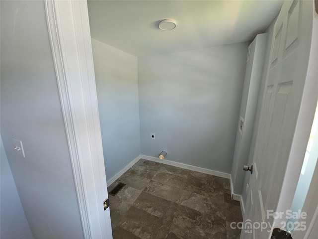 1704 16th St NE, Hickory, NC 28601 - laundry room with dark stone finish flooring and hookup for an electric dryer