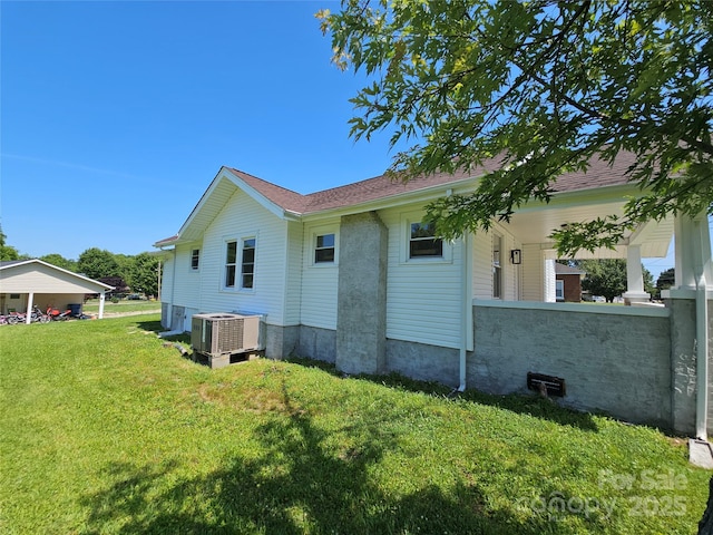 1704 16th St NE, Hickory, NC 28601 - view of property exterior featuring a yard and a central AC unit
