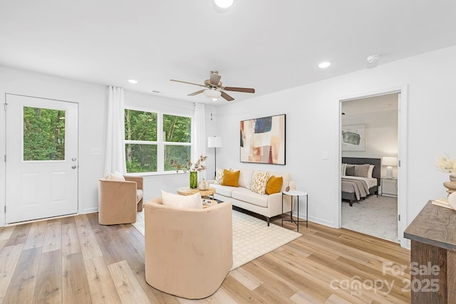 4474 Pebblebrook Cir SW, Concord, NC 28027 - living room with light wood-type flooring, a ceiling fan, and recessed lighting