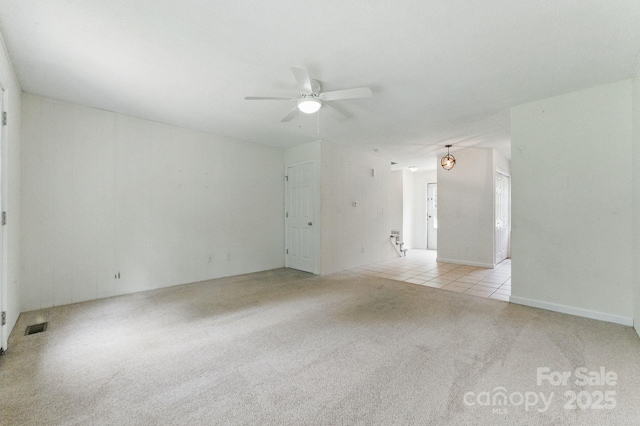 4681-4709 Grassy Creek Rd, Denver, NC 28037 - empty room with carpet flooring, ceiling fan, and stairway