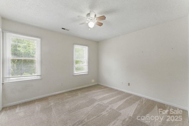 4681-4709 Grassy Creek Rd, Denver, NC 28037 - carpeted spare room with ceiling fan and a textured ceiling