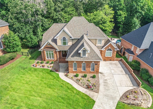 10405 Lady Grace Ln, Charlotte, NC 28270 - view of front of house with brick siding, driveway, and roof with shingles