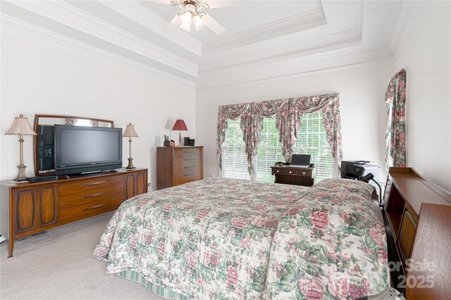 10405 Lady Grace Ln, Charlotte, NC 28270 - carpeted bedroom with a tray ceiling, crown molding, and a ceiling fan