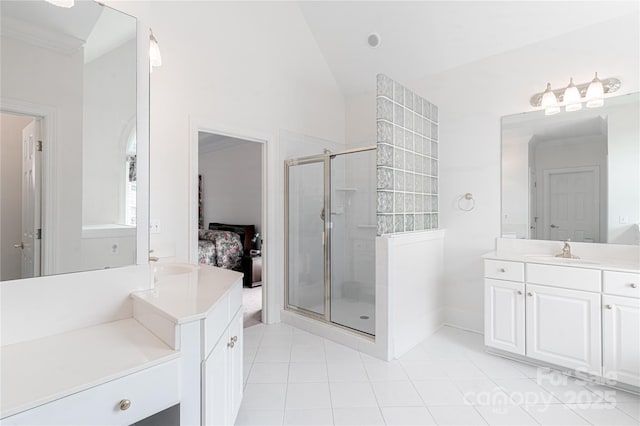 10405 Lady Grace Ln, Charlotte, NC 28270 - bathroom featuring a shower stall, tile patterned flooring, two vanities, connected bathroom, and vaulted ceiling