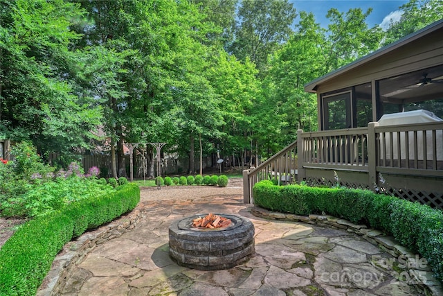 10405 Lady Grace Ln, Charlotte, NC 28270 - view of patio / terrace with an outdoor fire pit and a sunroom