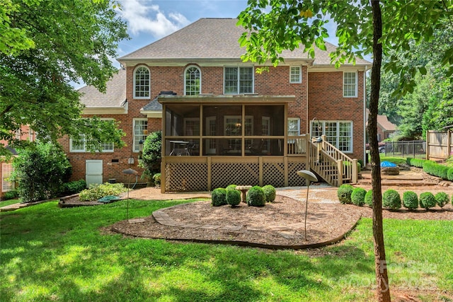 10405 Lady Grace Ln, Charlotte, NC 28270 - back of property featuring a sunroom, a shingled roof, and brick siding