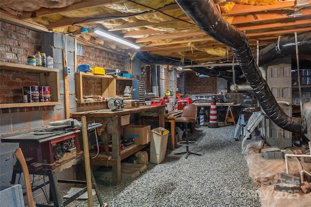 10405 Lady Grace Ln, Charlotte, NC 28270 - unfinished basement with a workshop area
