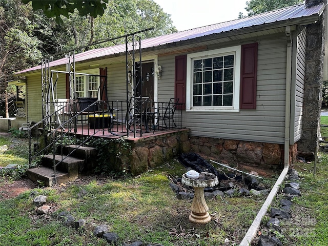 1041 Tomlinson Loop, Connelly Springs, NC 28612 - view of front facade with a metal roof