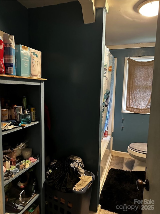 1041 Tomlinson Loop, Connelly Springs, NC 28612 - bathroom featuring toilet and shower / tub combo