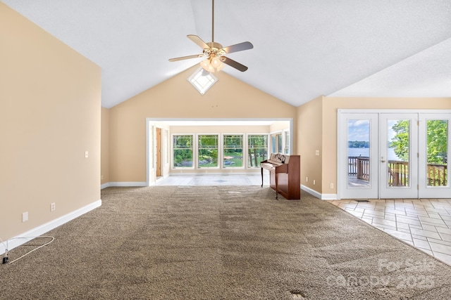 698 Normandy Rd, Mooresville, NC 28117 - unfurnished living room with a ceiling fan, light colored carpet, light tile patterned flooring, and high vaulted ceiling