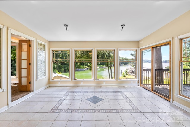 698 Normandy Rd, Mooresville, NC 28117 - unfurnished sunroom featuring a water view and tile patterned flooring