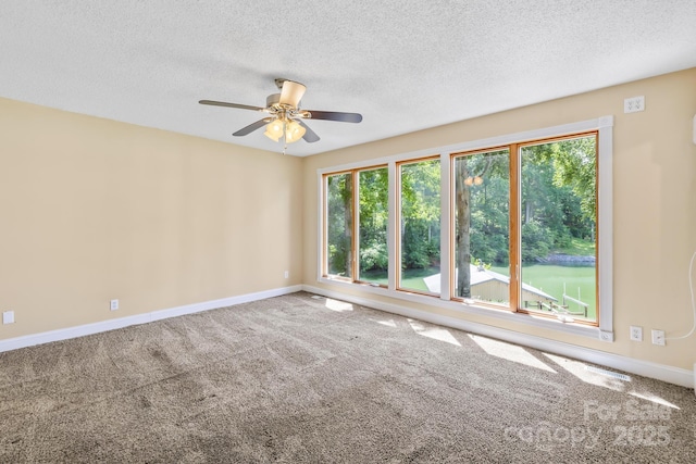 698 Normandy Rd, Mooresville, NC 28117 - unfurnished room with carpet, a textured ceiling, and ceiling fan